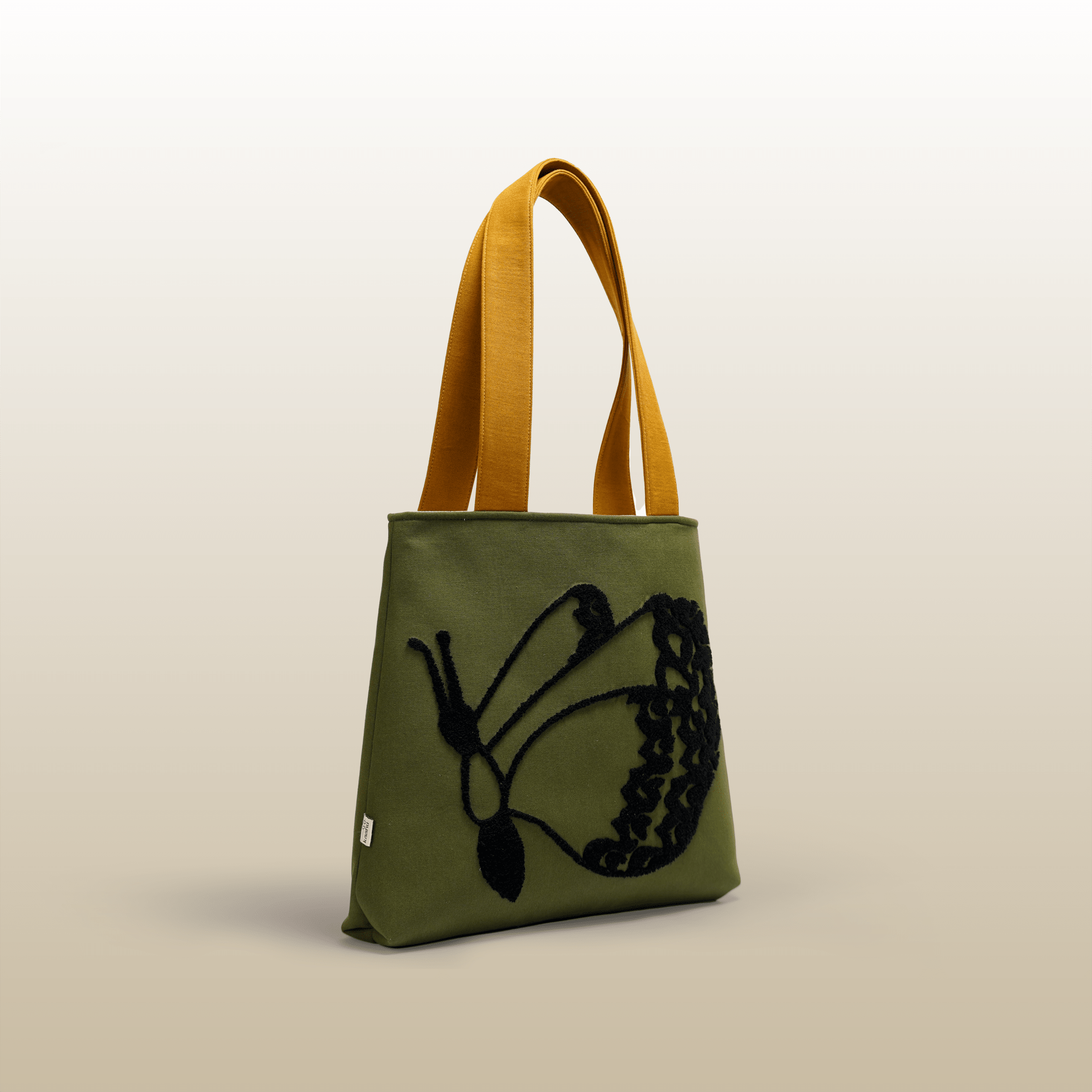 Flutter Butter Tote - Kaahu
PDP label: 3/4 VIEW