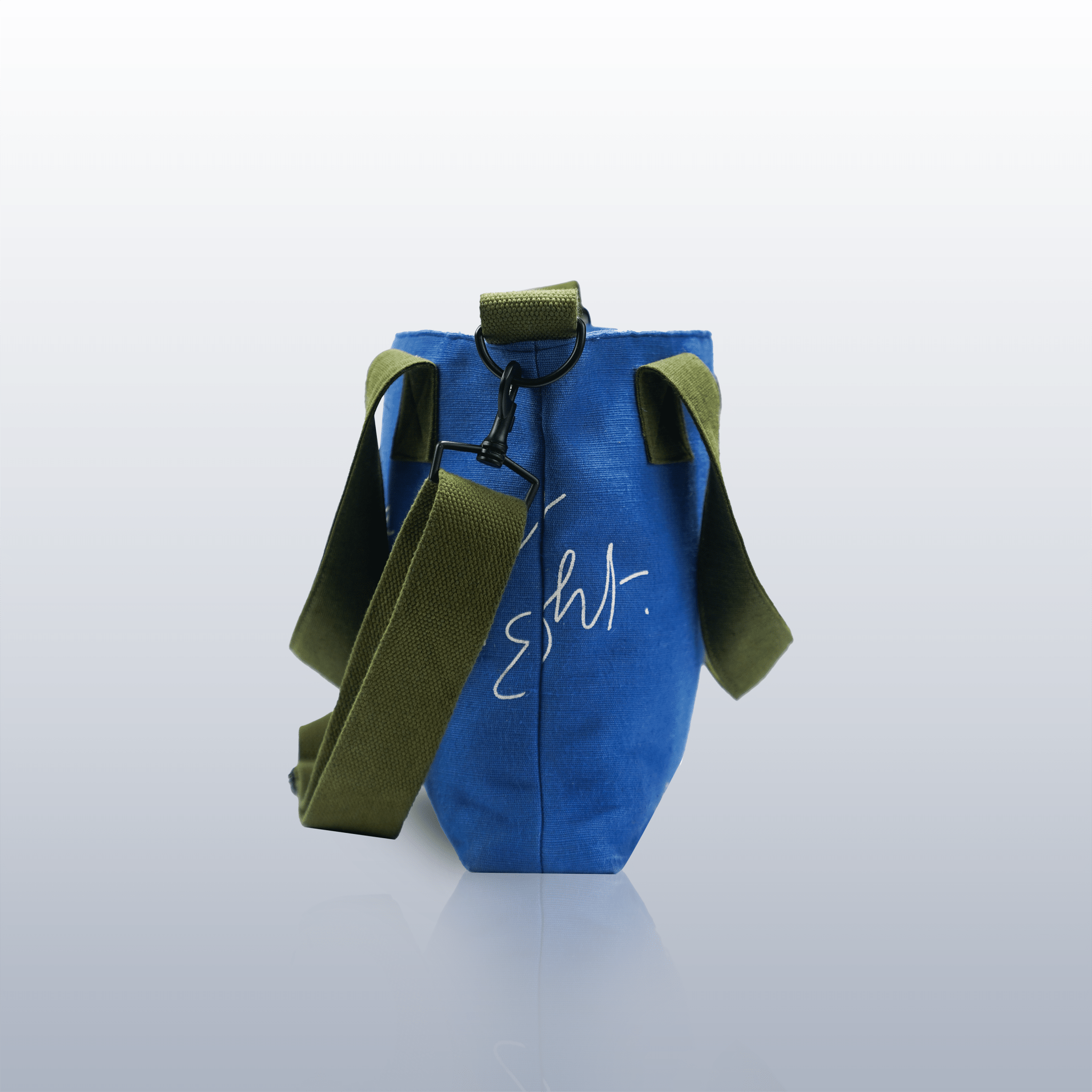 Guiding Glow Messenger Bag - Kaahu, organic cotton, sustainable blue bag
PDP label: DETACHABLE STRAP