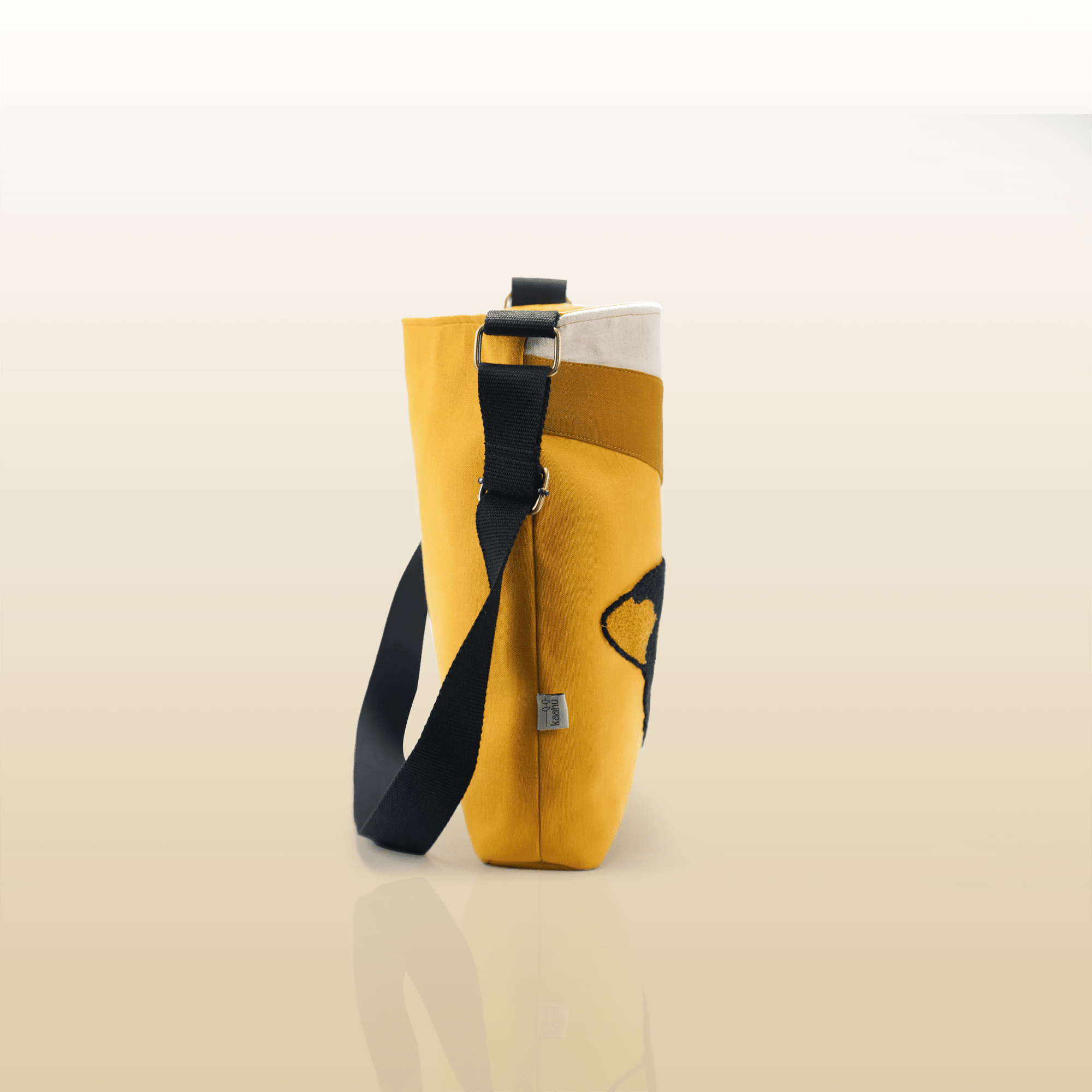 Golden Orca Tote - Kaahu
PDP label: SIDE VIEW