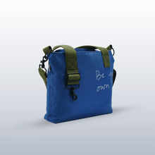Guiding Glow Messenger Bag - Kaahu, organic cotton, sustainable bag
PDP label: MATTE BLACK HARDWARE