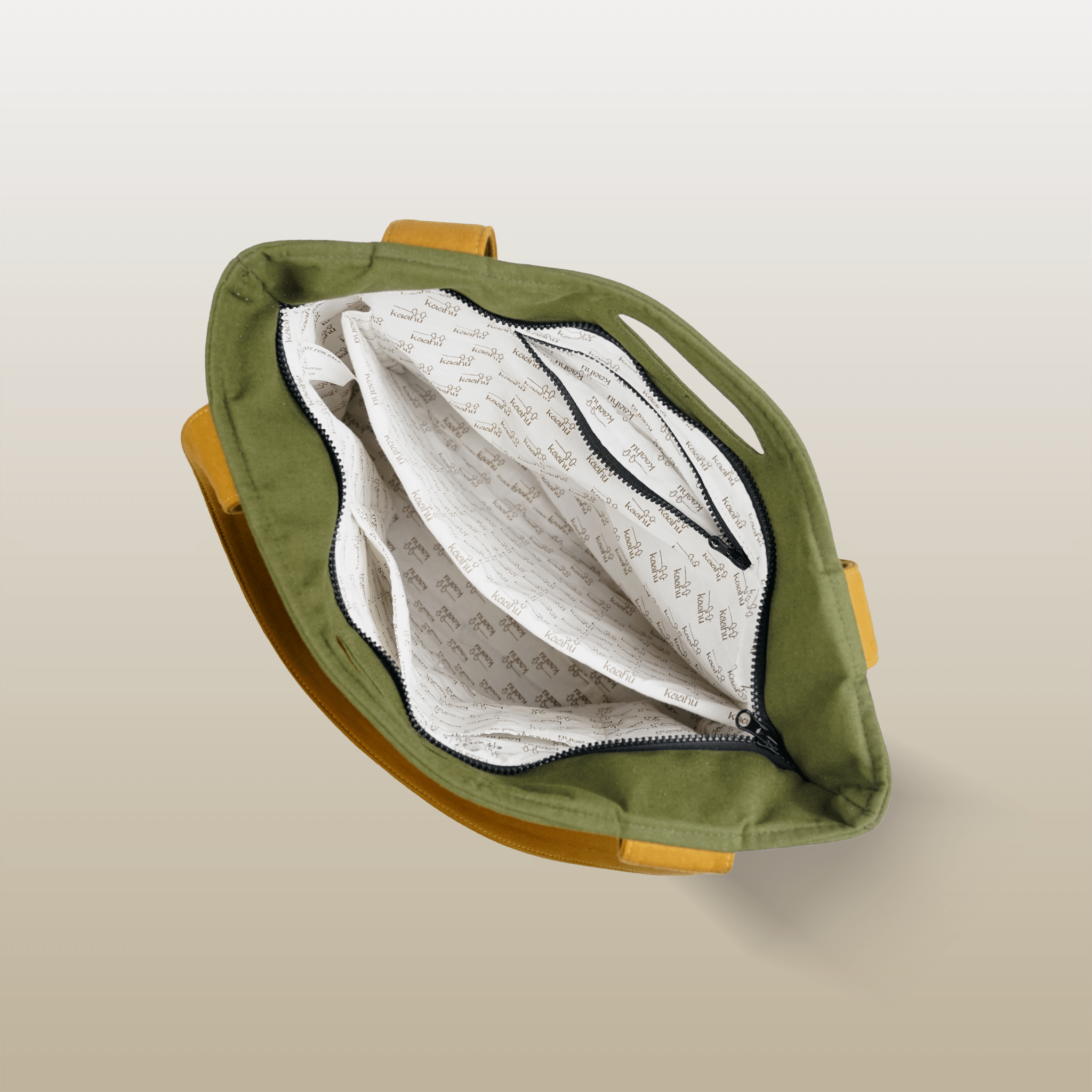Silent Guardian Tote - Kaahu
PDP label: TOP VIEW